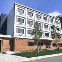 Completed commercial siding project by Marvelous Construction Ltd. Modern commercial building with fiber cement siding and metal exterior by Marvelous Construction
