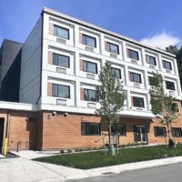 Completed commercial siding project by Marvelous Construction Ltd. Modern commercial building with fiber cement siding and metal exterior by Marvelous Construction