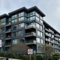 Modern condo exterior siding finishing project Modern multi-storey condo building with exterior siding. Marvelous Construction
